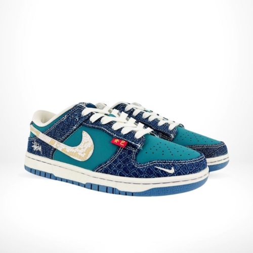 Angled front view of a full pair of Nike SB Dunk Low