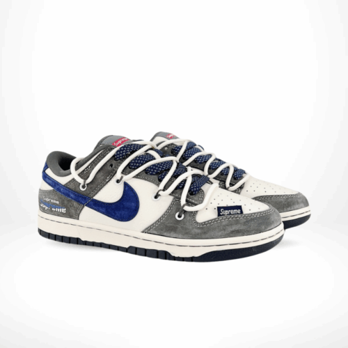 Angled front view of a full pair of Nike SB Dunk Low