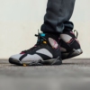 Angled front view of a full pair of Air Jordan 7