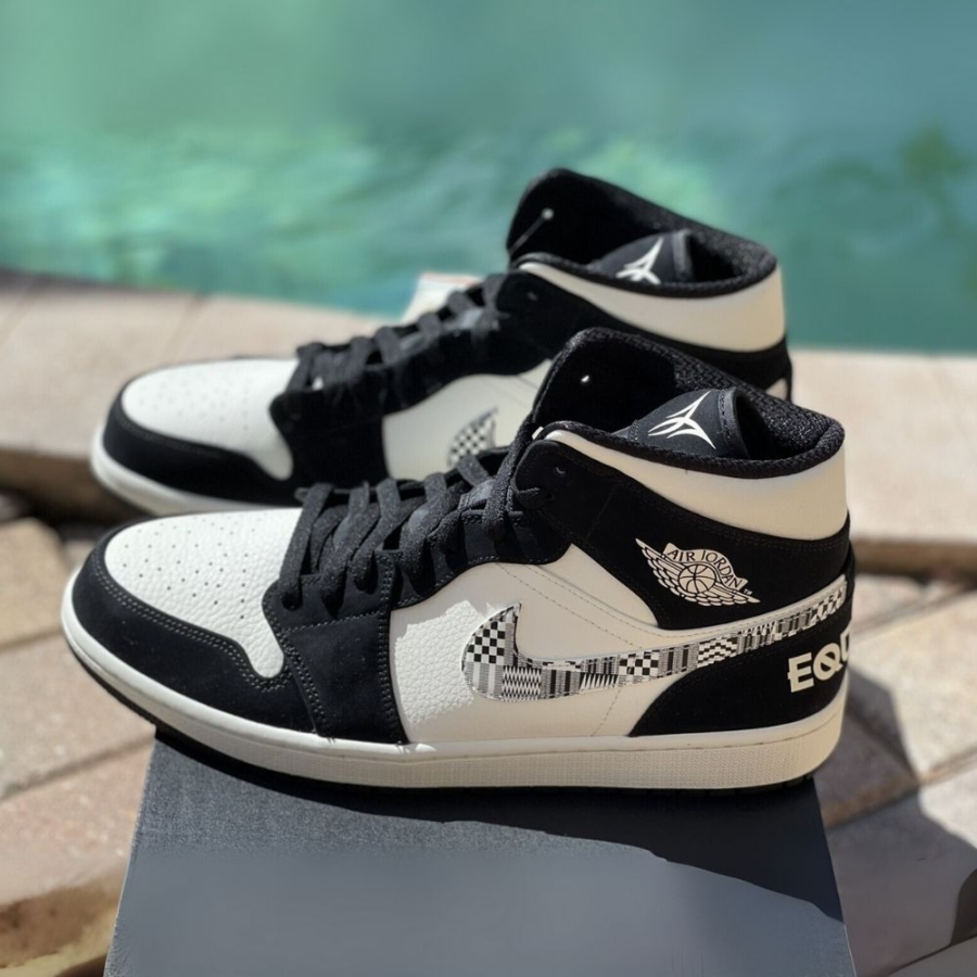 Angled front view of a full pair of Air Jordan 1