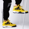 Real lifestyle image of Air Jordan 4