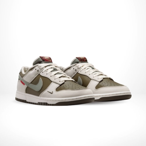Angled front view of a full pair of Nike Dunk Low