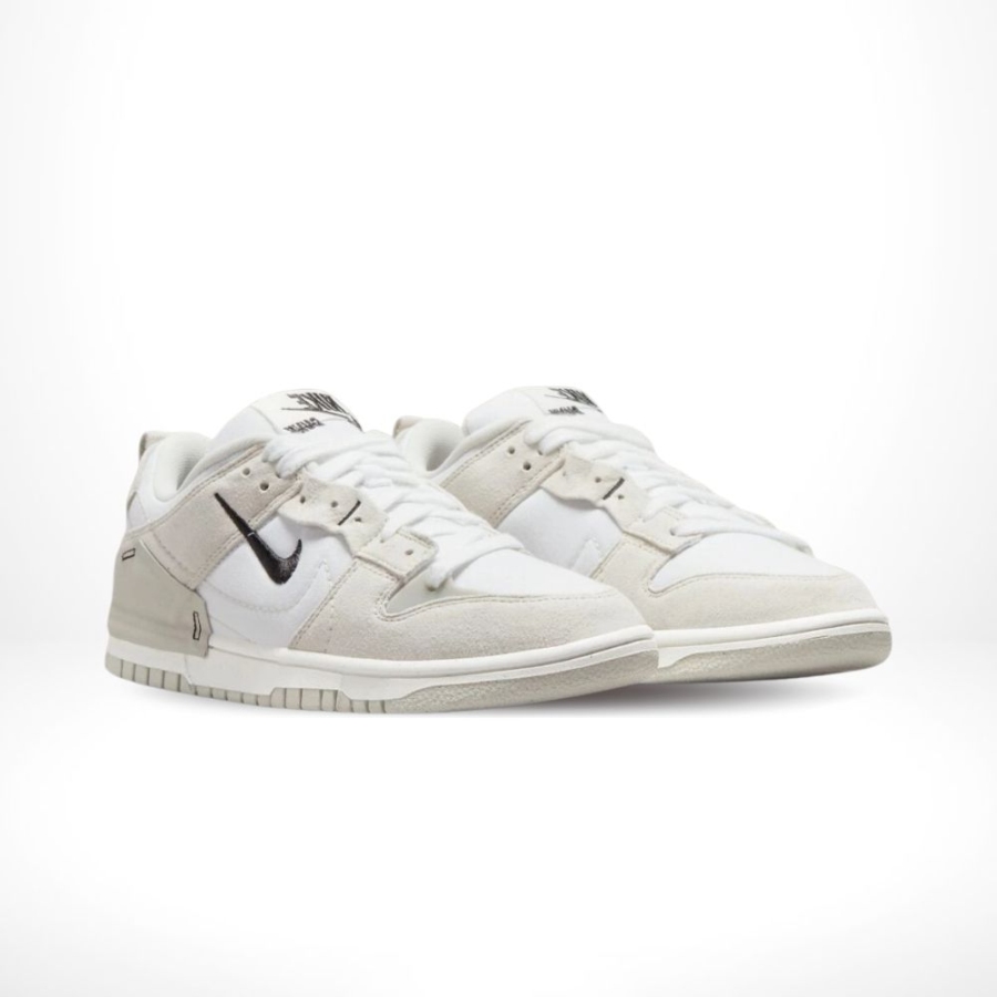 Angled front view of a full pair of Nike Dunk Low