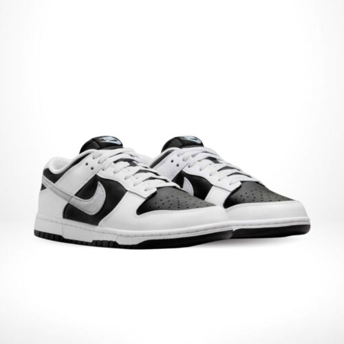 Angled front view of a full pair of Nike Dunk Low