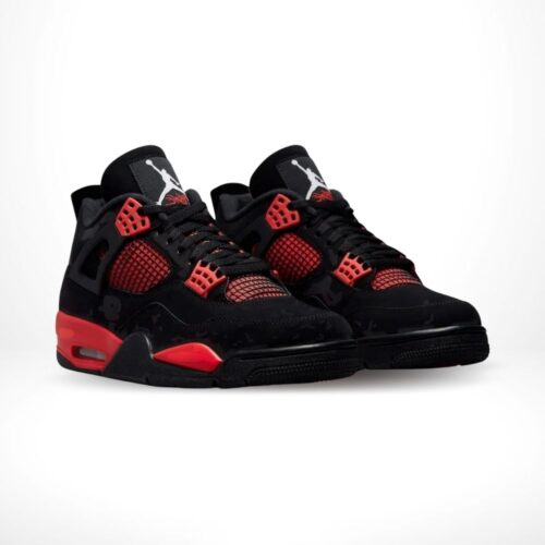 Angled front view of a full pair of Air Jordan 4
