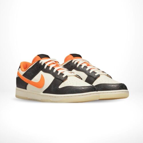 Angled front view of a full pair of Nike Dunk Low