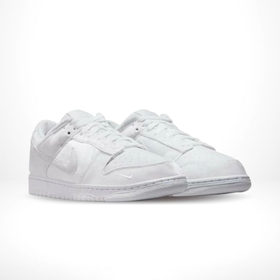 Angled front view of a full pair of Nike Dunk Low