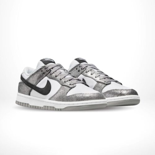 Angled front view of a full pair of Nike Dunk Low