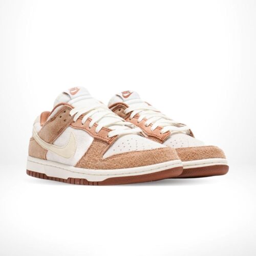 Angled front view of a full pair of Nike Dunk Low