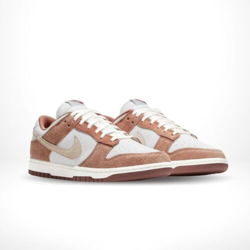 Angled front view of a full pair of Nike Dunk Low