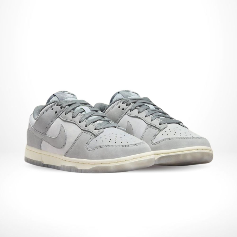 Angled front view of a full pair of Nike Dunk Low