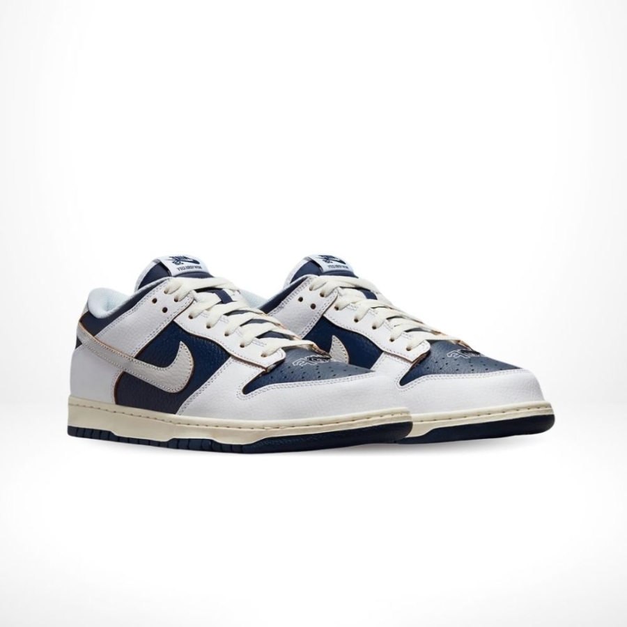 Angled front view of a full pair of Nike SB Dunk Low