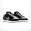 Angled front view of a full pair of Nike SB Dunk Low