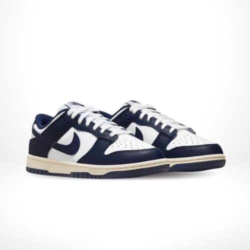 Angled front view of a full pair of Nike Dunk Low