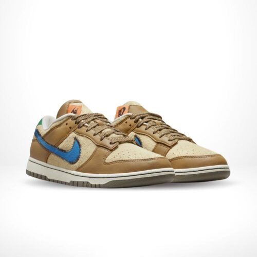 Angled front view of a full pair of Nike Dunk Low